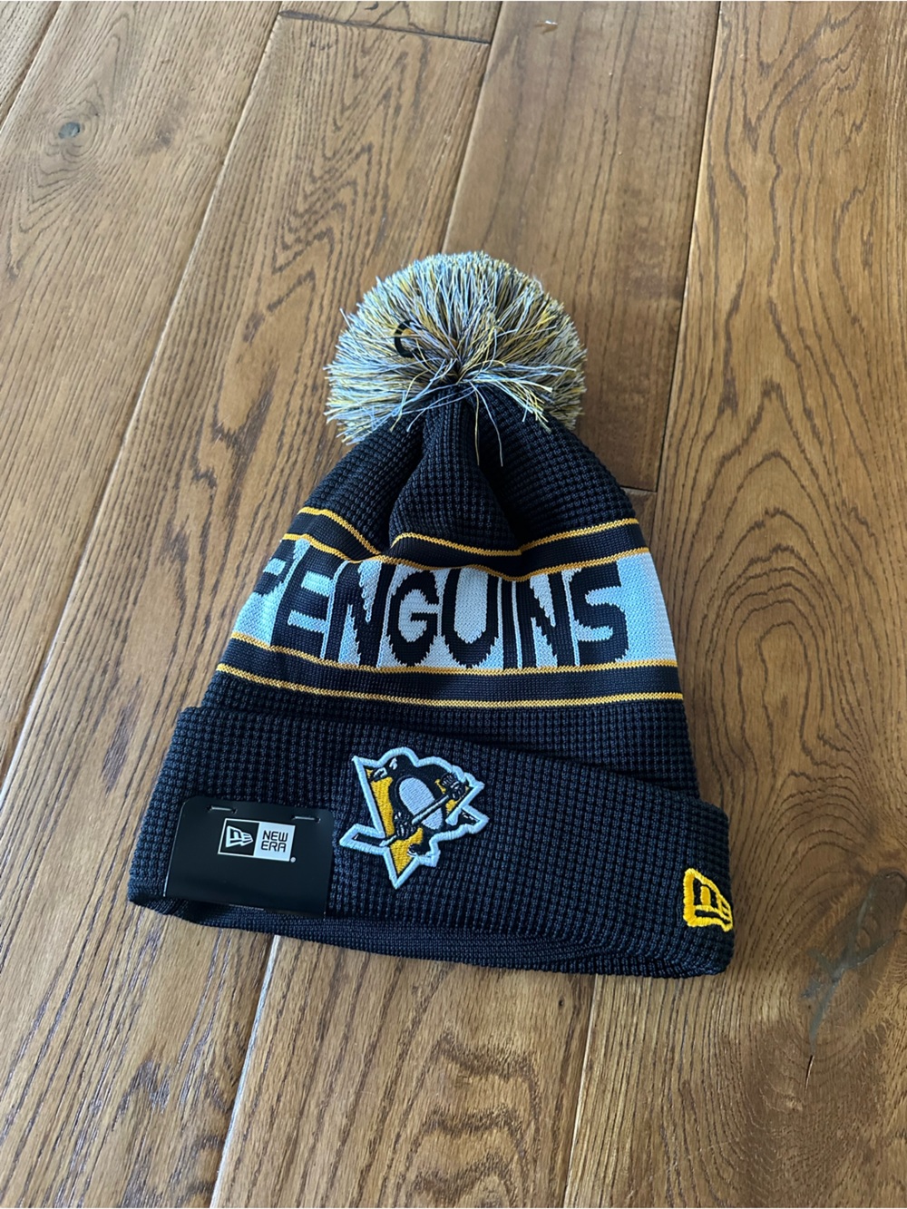 New Era Black Knit Pom Beanie with Gold Accent